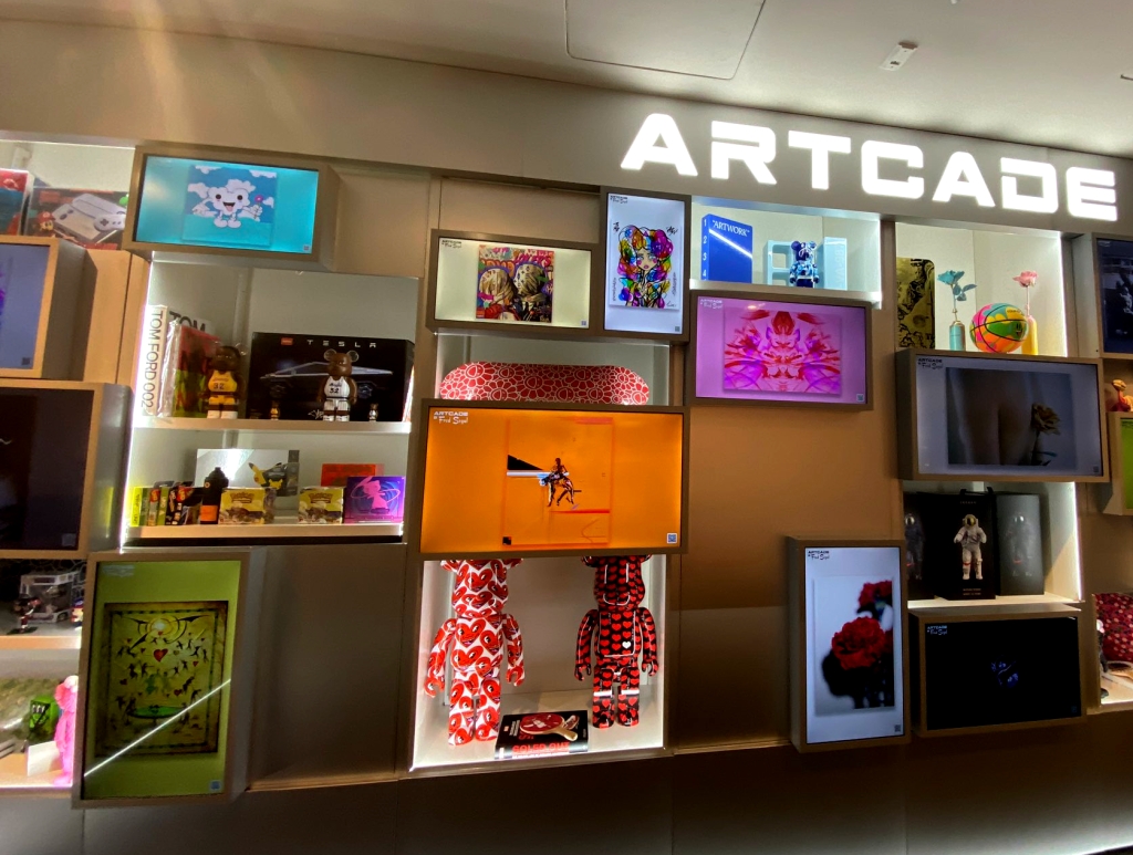 a limited edition NFT 'Trampoline of Life/love' on display in a digital frame at Artcade Fred Segal store in LA 2022.